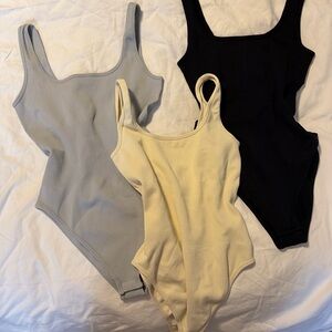BRAND NEW 3 pc ribbed bodysuits, size medium, grey,black&cream!